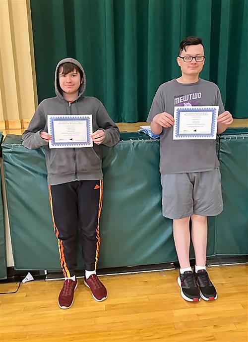 Two Heatly students with certificates