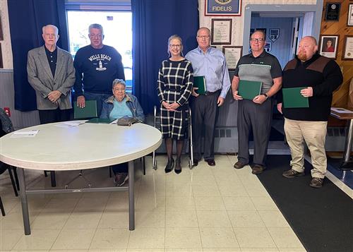 Green Island presents local veterans with diplomas