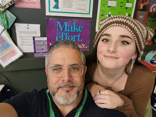 Secondary math teacher Nick Grolley with daughter Mia