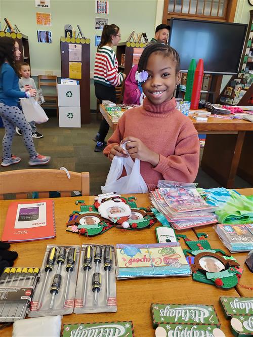 Child smiling in Santa's Workshop